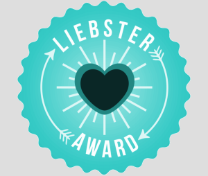 A teal circle with a heart in the center. Lobster Award is written around the edges with two arrows circling the heart.